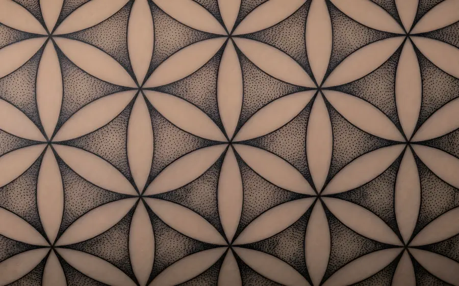 Close-up of a Flower of Life tattoo pattern.